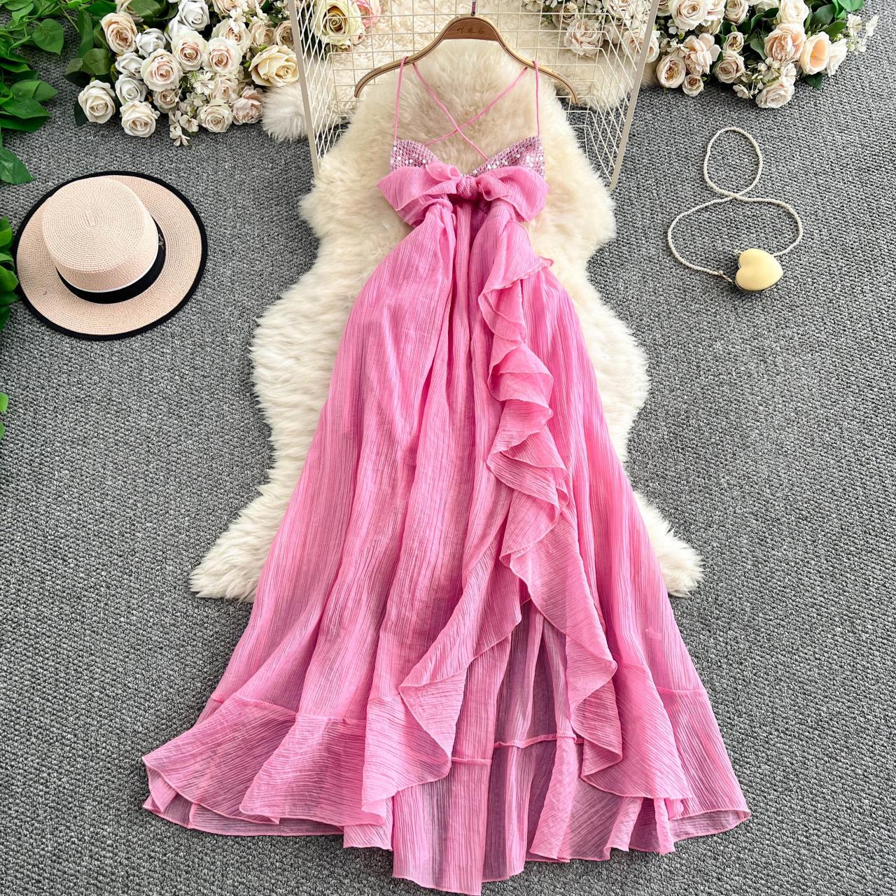 pink flowy ruffle dress THE DULCE TIERED SMOCKED RUFFLE DRESS IN PINK Large