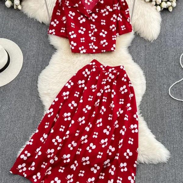 red floral two piece dress New in Floral Two Piece Damask Skirt Set Available in all sizes from 6 -  24 Price - 75,000 Length - Color